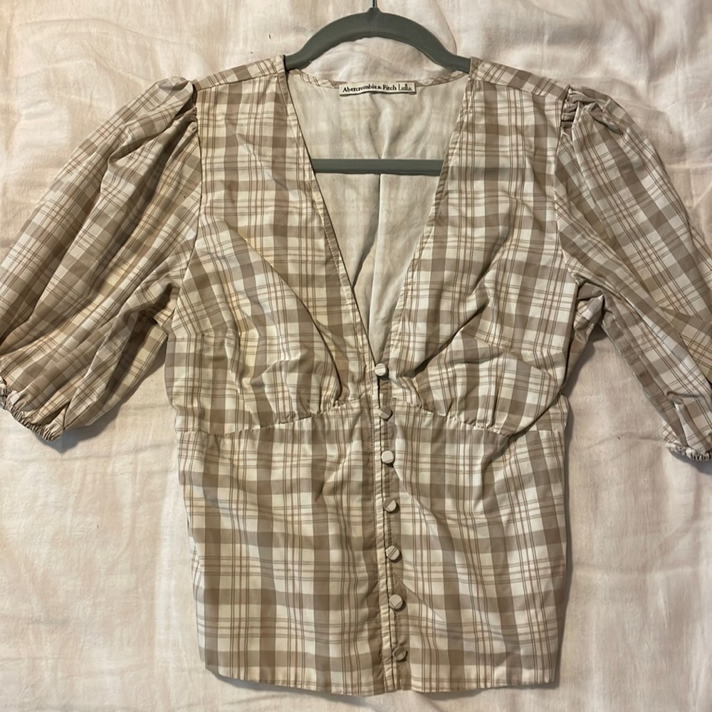 Tan and white v neck smocked blouse
